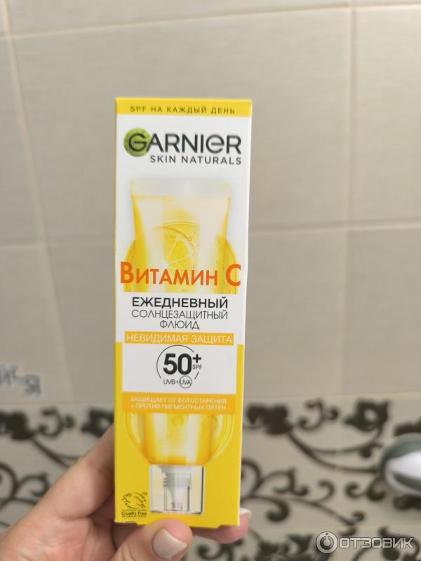 Garnier солнцезащитный флюид 50