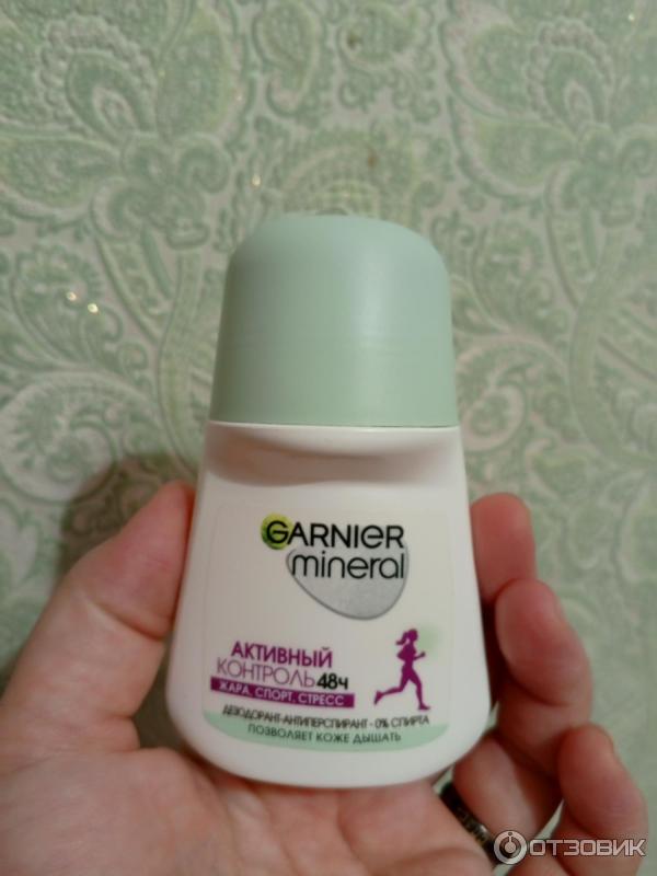 Шариковый дезодорант Garnier Mineral deodorant 48 часов защиты с активными минералами фото