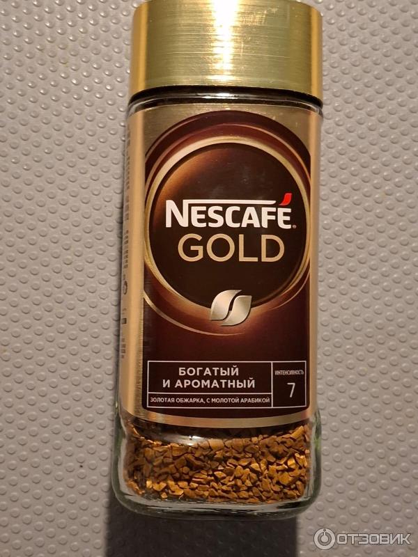 Кофе Nescafe Gold растворимый сублимированный с добавлением натурального жаренного молотого кофе фото