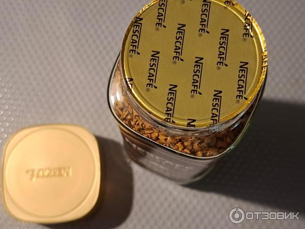 Кофе Nescafe Gold растворимый сублимированный с добавлением натурального жаренного молотого кофе фото